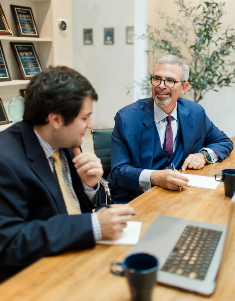 Provinziano & Associates, men sitting at a table