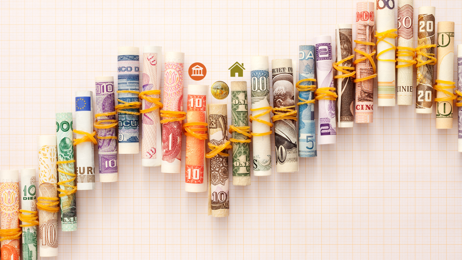 Rolled international currency bills tied with elastic bands representing international assets in divorce cases