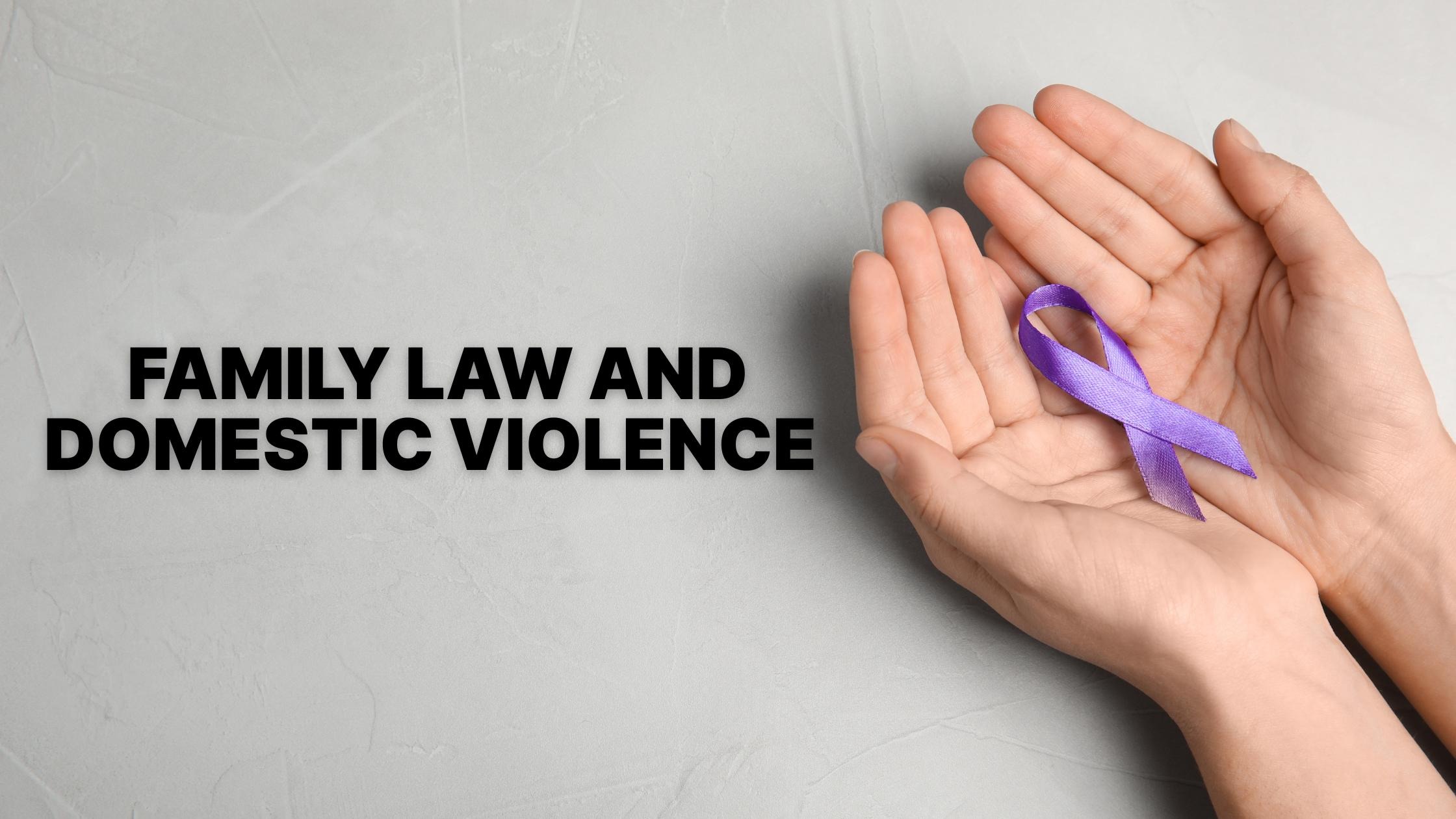 Hands gently holding a purple ribbon symbolizing support for domestic violence awareness and family law protection in California.